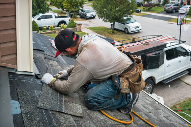 Professional Roofing technician working in Prague, NE